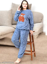 Cozy blue fleece women's woolen pajama set with cute bear design, perfect for cold nights and winter lounging